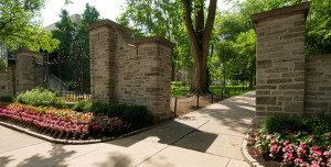 A stone gateway along College Avenue leading into the University Park campus.